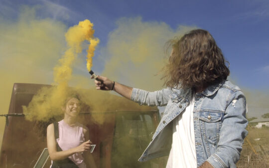 Playing With A Yellow Smoke Bomb 540x337